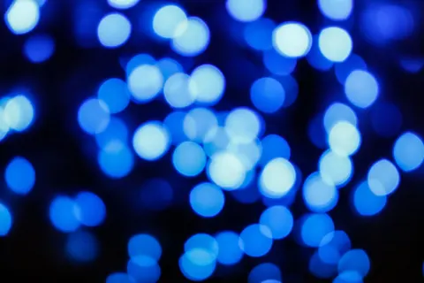 خلفية جسيمات متوهجة بدقة 4K · abstract · 3840×2560