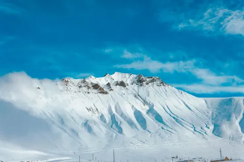 Snowy Mountain Peak 4K Wallpaper · mountains · 3840×2553