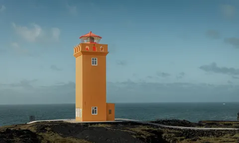 Lighthouse Coast 4K Wallpaper · ocean · 3840×2296