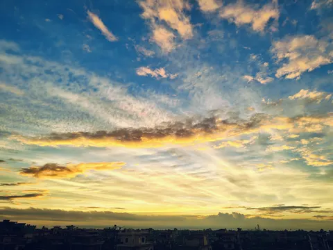 A vibrant sunset sky filled with a mix of blue, orange, and  4K Wallpaper · nature · 3840×2880