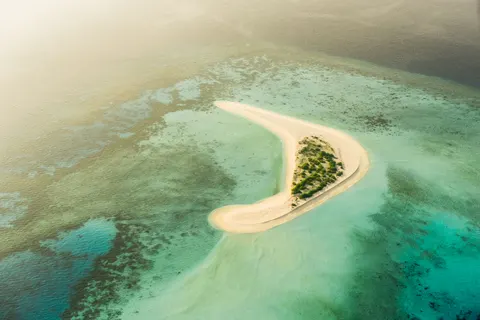 Island Aerial 4K Wallpaper · ocean · 3840×2563