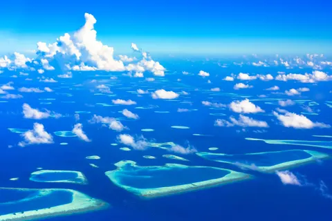 Sfondo Isola dal Drone 4K · ocean · 3840×2563