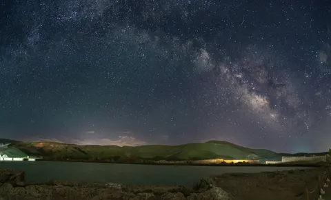Milky Way over Sea 4K Wallpaper · space · 3840×2325