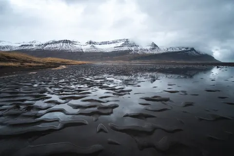Black Sand Beach 4K Wallpaper · travel · 3840×2560
