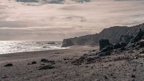 Black Sand Beach 4K Wallpaper · travel · 3840×2160