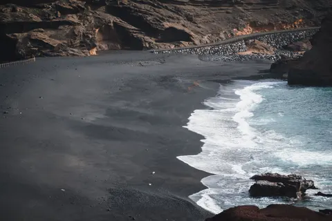 Black Sand Beach 4K Wallpaper · travel · 3840×2560