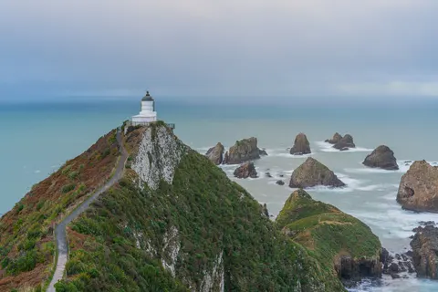 Cliff Lighthouse 4K Wallpaper · architecture · 3840×2561