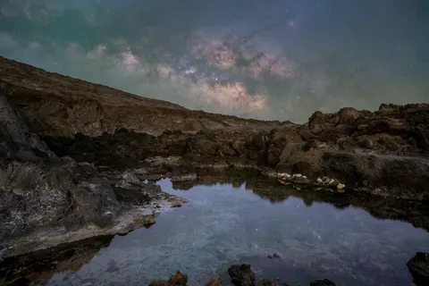 Melkweg boven Zee 4K-achtergrond · space · 3840×2560