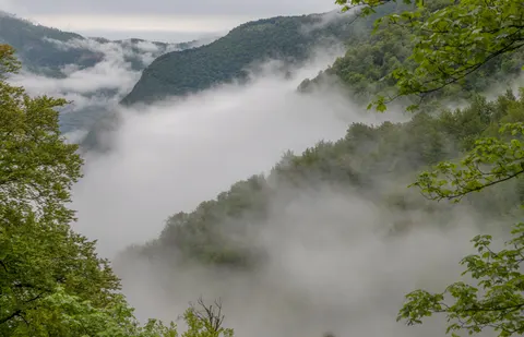 Foggy Valley 4K Wallpaper · mountains · 3840×2474