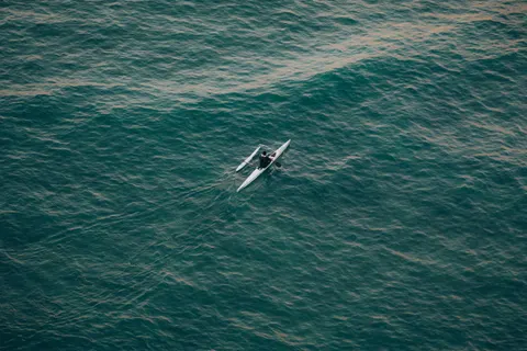 Boat at Sea 4K Wallpaper · ocean · 3840×2560