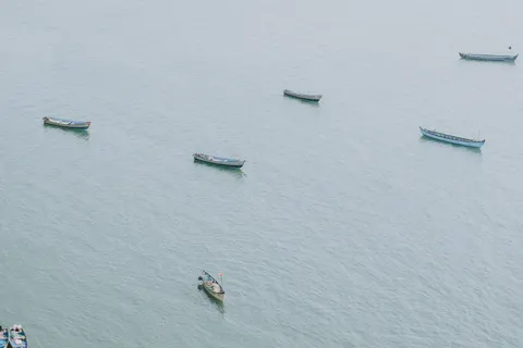 Boat at Sea 4K Wallpaper · ocean · 3840×2560