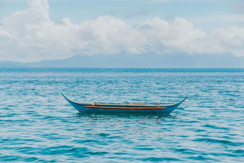 Boat at Sea 4K Wallpaper · ocean · 3840×2560