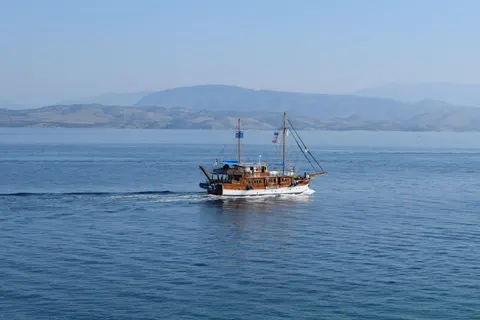 Boat at Sea 4K Wallpaper · ocean · 3840×2560