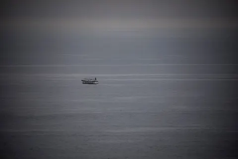Boat at Sea 4K Wallpaper · ocean · 3840×2560