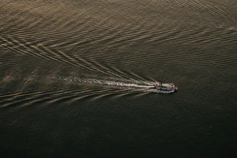 Boat at Sea 4K Wallpaper · ocean · 3840×2563