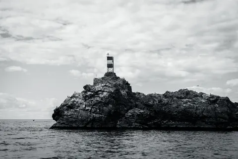 Cliff Lighthouse 4K Wallpaper · architecture · 3840×2560