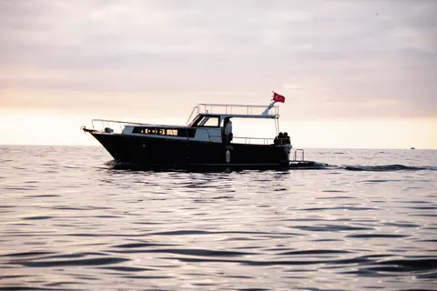 Boat at Sea 4K Wallpaper · ocean · 3840×2560