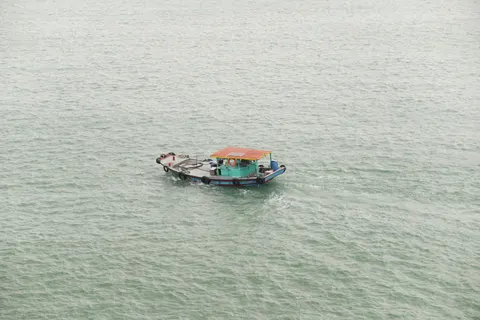 Boat at Sea 4K Wallpaper · ocean · 3840×2560