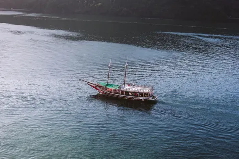 Boat at Sea 4K Wallpaper · ocean · 3840×2560