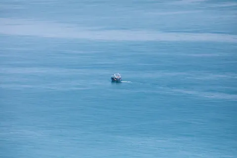 Boat at Sea 4K Wallpaper · ocean · 3840×2560