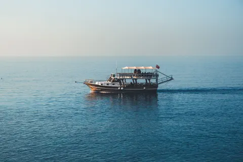 Boat at Sea 4K Wallpaper · ocean · 3840×2560