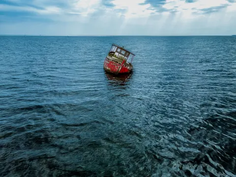 Boat at Sea 4K Wallpaper · ocean · 3840×2880