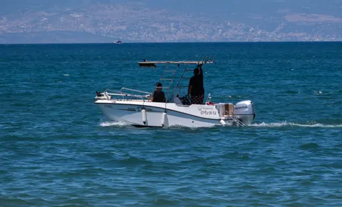 Boat at Sea 4K Wallpaper · ocean · 3840×2322