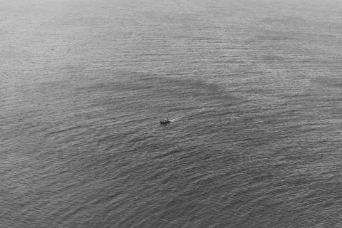 Boat at Sea 4K Wallpaper · ocean · 3840×2560