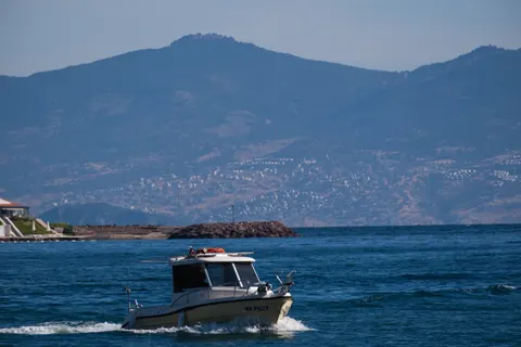Boat at Sea 4K Wallpaper · ocean · 3840×2560