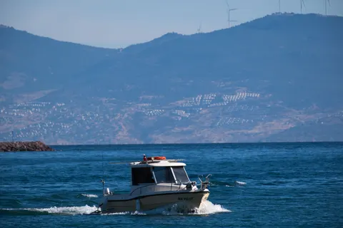 Boat at Sea 4K Wallpaper · ocean · 3840×2560