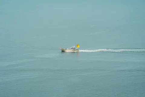 Boat at Sea 4K Wallpaper · ocean · 3840×2560