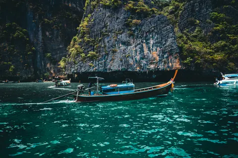 Boat at Sea 4K Wallpaper · ocean · 3840×2561
