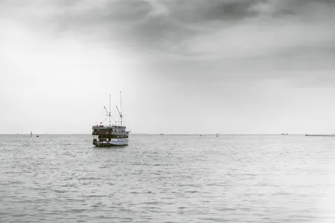 Boat at Sea 4K Wallpaper · ocean · 3840×2560