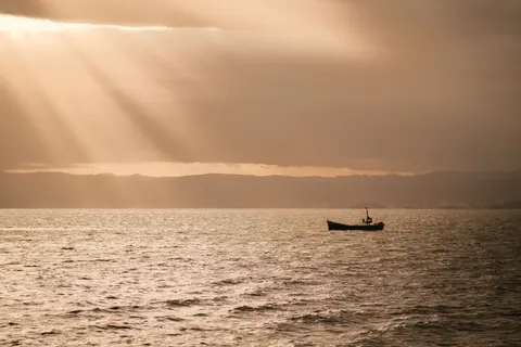 Boat at Sea 4K Wallpaper · ocean · 3840×2560