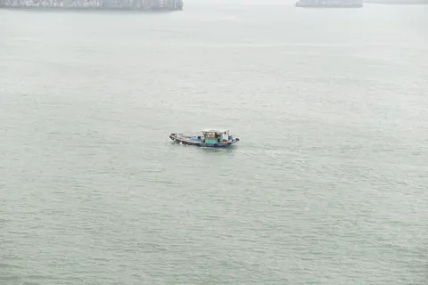 Boat at Sea 4K Wallpaper · ocean · 3840×2560