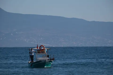 Boat at Sea 4K Wallpaper · ocean · 3840×2560