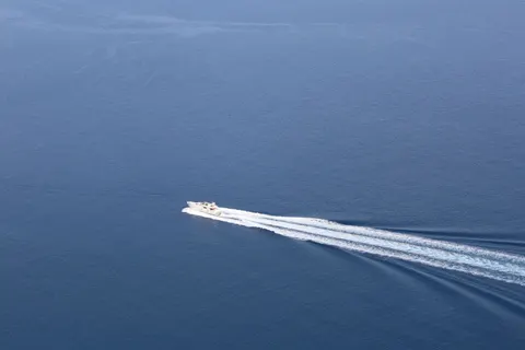 Boat at Sea 4K Wallpaper · ocean · 3840×2560