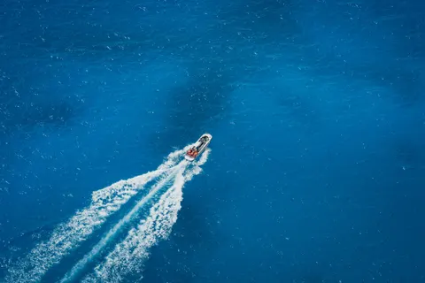 Boat at Sea 4K Wallpaper · ocean · 3840×2560