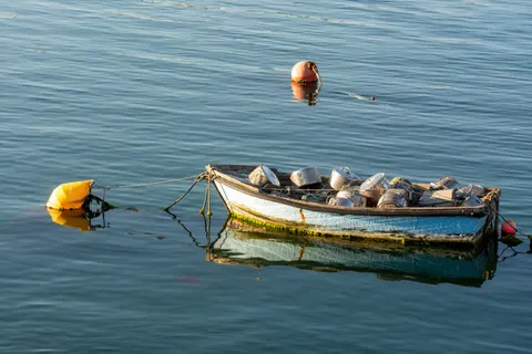 Boat at Sea 4K Wallpaper · ocean · 3840×2560