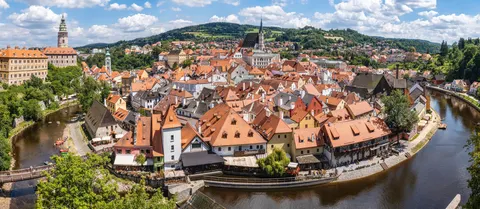 Prague Rooftops 4K Wallpaper · city · 3840×1668