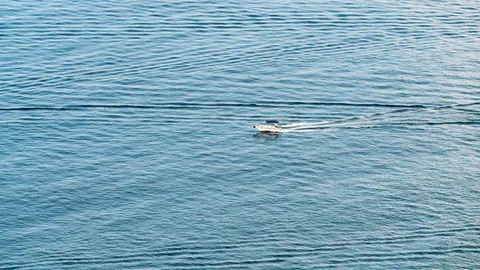 Boat at Sea 4K Wallpaper · ocean · 3840×2160