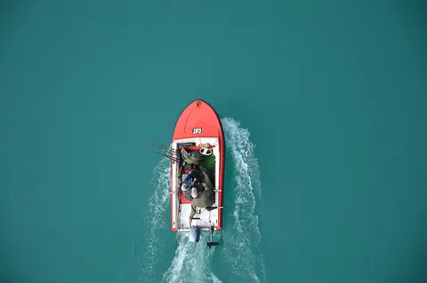 Boat at Sea 4K Wallpaper · ocean · 3840×2553