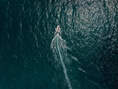 Boat at Sea 4K Wallpaper · ocean · 3840×2880