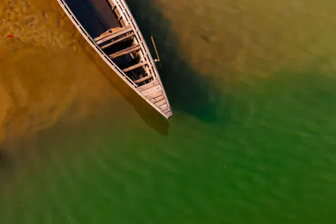 Boat at Sea 4K Wallpaper · ocean · 3840×2560