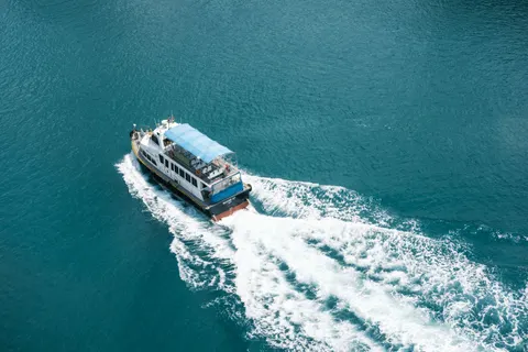 Boat at Sea 4K Wallpaper · ocean · 3840×2560