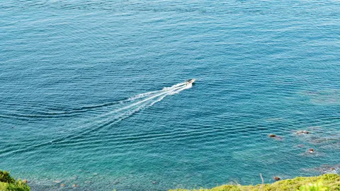 Boat at Sea 4K Wallpaper · ocean · 3840×2160