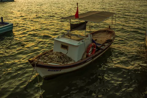Boat at Sea 4K Wallpaper · ocean · 3840×2560